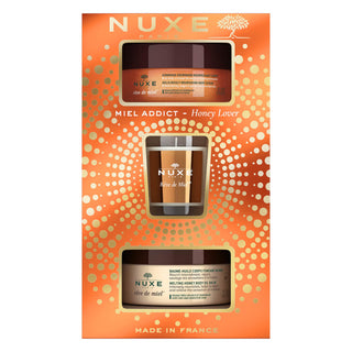 Cofanetto Natale 2022 Nuxe: Reve de Miel Deliciously Vegan Calming Body Scrub 175 ml + Reve de Miel Honey Body Balm All Body 200 ml + Reve de Miel Scented Candle 70 g